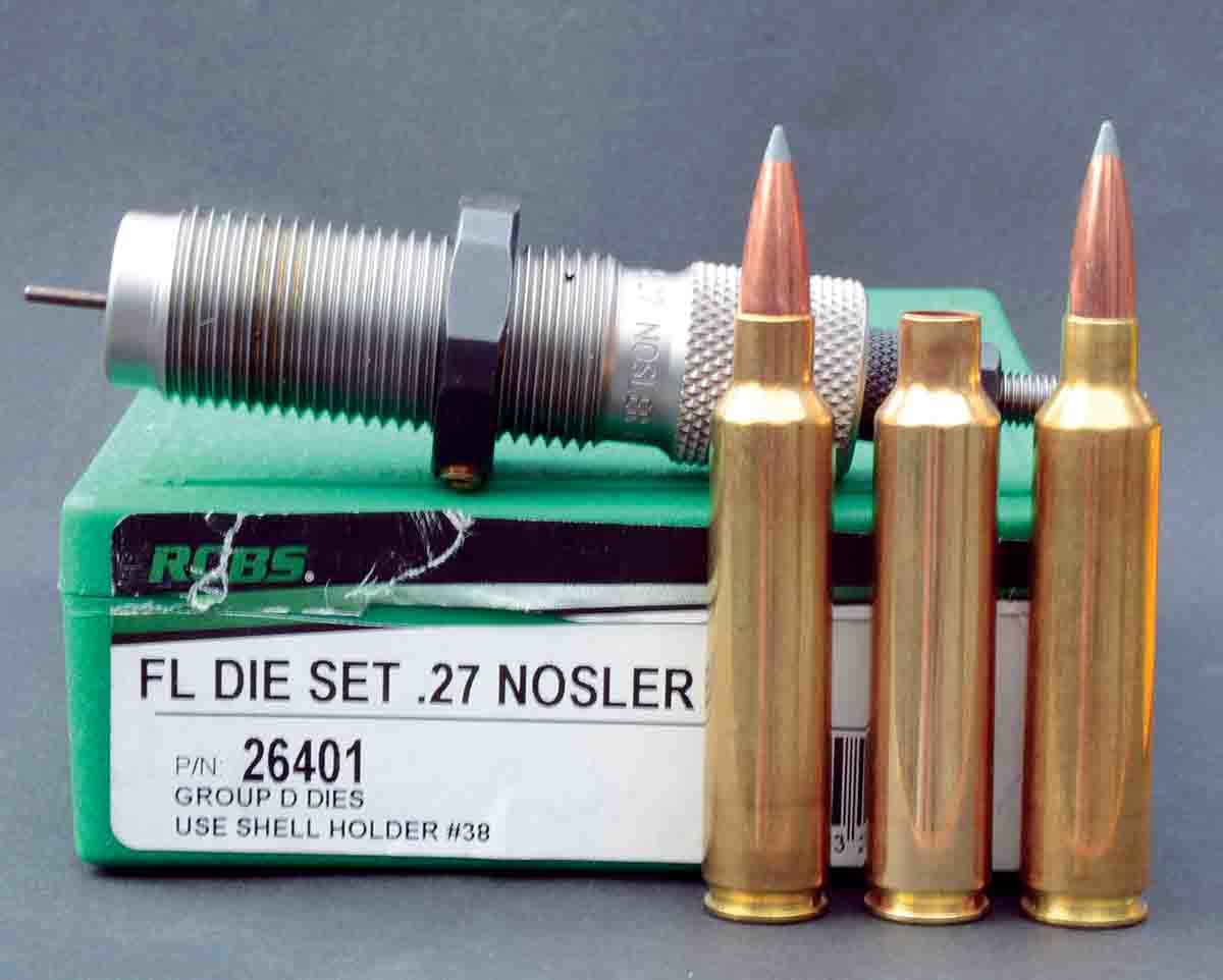 The .27 Nosler case is formed by necking down the .30 Nosler case. Shown (left to right) is a .30 Nosler cartridge, a .30 Nosler case and a .27 Nosler cartridge.
